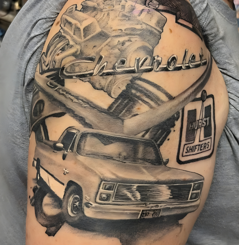 Black and grey Chevrolet car tattoo with realistic detailing and Hurst Shifters logo, created by Bullet’s Ink in Mt Airy, Maryland.