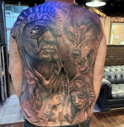 Realistic Native American and wolf full back tattoo by Bullet’s Ink in Mt Airy, Maryland — expert black and grey tattoo art near Frederick MD.