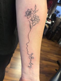 Fine line floral tattoo with woman silhouette and name Bailey by Robyn at Bullet’s Ink in Mount Airy MD