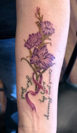 Purple floral awareness tattoo with script lettering by Robyn at Bullet’s Ink in Mount Airy MD