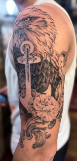 U.S. Navy sleeve tattoo with eagle and anchor by Robyn Hardman